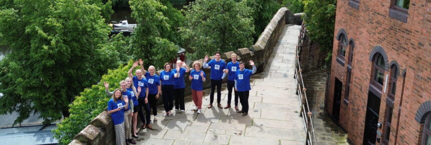 A few memebers of Legat Owen on the Chester City Walls wearing their charity t-shirts